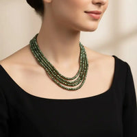 3 line Emerald Elegance Gemstones