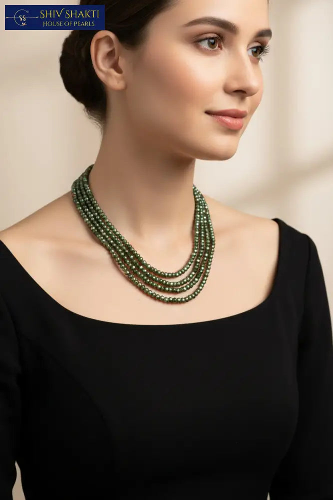 3 line Emerald Elegance Gemstones