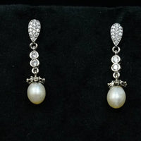 Snowy Pearl Dangler Earring Pearl Earrings